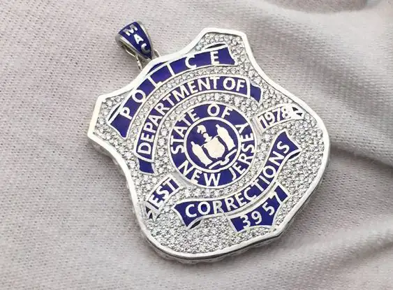 Gold police badge pendant