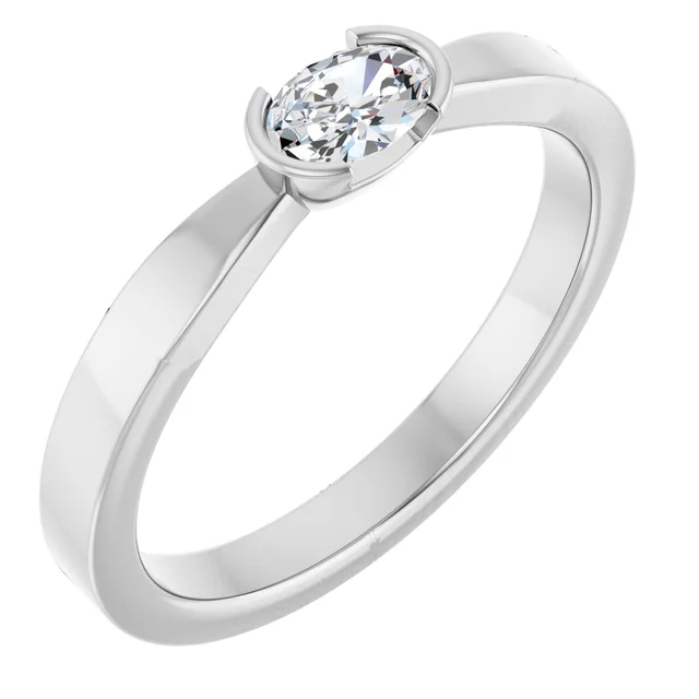 Shop the elegant Oval Cut Lab Diamond Ring set in 14K white gold. Featuring a 1/4 CT lab-grown diamond, this sustainable and luxurious ring is perfect for engagements, anniversaries, or special gifts. With a sleek bezel setting and rhodium-plated finish, it offers both beauty and durability. Order now for fast international shipping.