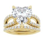 This captivating 2CT Heart Cut Lab Diamond Engagement Ring Set highlights a romantic and elegant design. It has a solid construction with a closed-back design, ensuring comfort and durability. The heart-shaped diamond and double-band pave setting bring an unforgettable charm to this timeless piece.