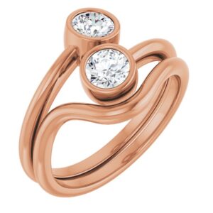 The Double Round Lab Diamond Twist Ring features two sparkling lab-grown diamonds in a unique twisted band design. Crafted in elegant rose gold, this minimalist piece symbolizes unity and love, making it perfect for couples or as a meaningful gift for any occasion.