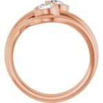 The Double Round Lab Diamond Twist Ring features two sparkling lab-grown diamonds in a unique twisted band design. Crafted in elegant rose gold, this minimalist piece symbolizes unity and love, making it perfect for couples or as a meaningful gift for any occasion.