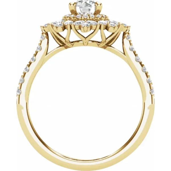 This Flower Halo Engagement Ring in 14K Yellow Gold showcases a stunning 7/8 CTW of lab-grown diamonds. Weighing 4.29 grams, the polished surface finish adds a radiant shine that complements the intricate flower halo design. The 5.2mm round-cut lab diamond is surrounded by a dazzling halo of smaller diamonds, creating an elegant and timeless aesthetic perfect for engagements or special occasions.