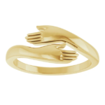 The Hug Ring is a heartfelt piece that symbolizes love, connection, and warmth. Crafted with precision, this unique design features two delicately sculpted hands embracing each other, making it a perfect statement of care and togetherness. Weighing 3.73 grams, this ring maintains a lightweight yet sturdy structure. The 1.5mm thickness ensures durability without compromising comfort. With approximate top dimensions of 8.3 x 2mm, the design remains sleek and elegant, making it ideal for daily wear. The polished surface enhances its refined look, adding a luxurious shine to its minimalist yet meaningful aesthetic.